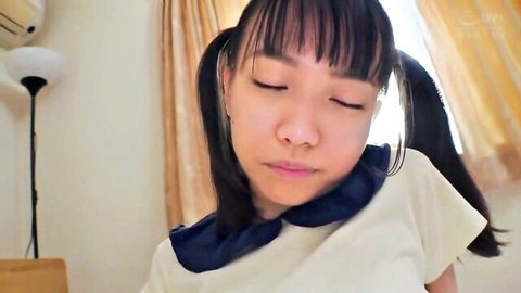 Asian JAV teen stepdaughter in blouse with pigtails, eyes closed seductively