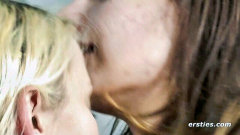 Blonde kissing brunette intimately in Ersties slow sex video