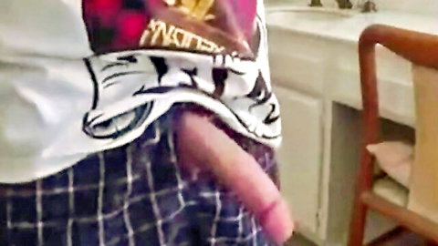 Lean twunk exposing erect cock from plaid pajamas for solo rubber masturbation