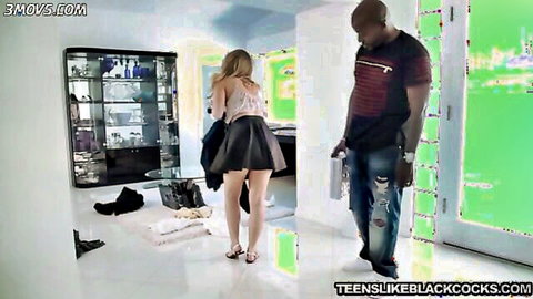 Harley Jade in short black skirt bending over with black stud