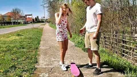Skinny blonde Poppy Pleasure in floral dress outdoors with handsome guy
