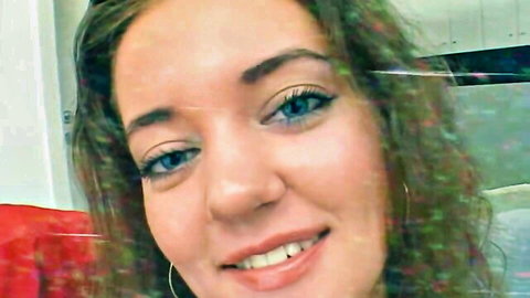 Karina Play big tits brunette smiling close-up with blue eyes and hoop earrings