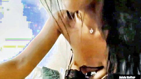 Adele Holter brunette MILF close-up seductive pose in lesbian video thumbnail