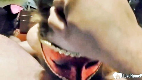 Hooded blond performs intense deepthroat in close-up oral action