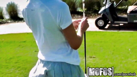 Dakota James in tight shorts bending over on golf course - Mofos