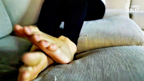Czech woman's bare foot soles in black leggings, foot fetish tease