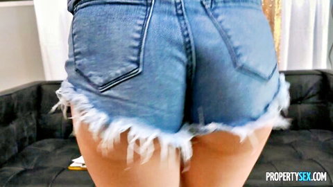 Petite Liz Jordan in frayed denim shorts, teasing ass from behind in POV