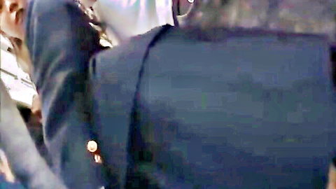Asian woman in uniform gets tits groped by suited men on crowded bus