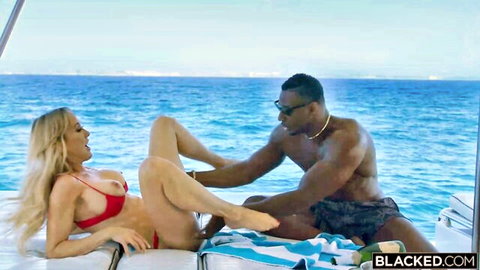 Brandi Love in red bikini with Jax Slayher on yacht, interracial tease