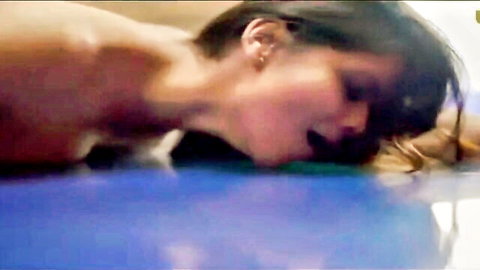 Desi Indian woman in ecstasy, topless lying back in Ullu hot series