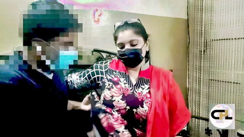 Pakistani MILF in floral salwar kameez and red dupatta with masked man in close encounter