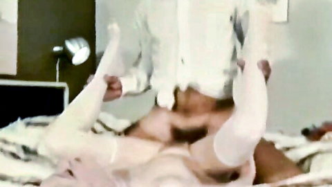 Vintage Danish XXX scene: woman in white stockings legs spread for penetration