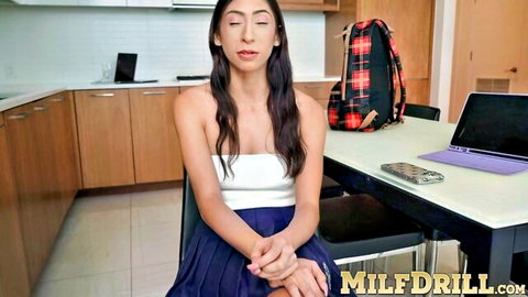 Sona Bella sexy brunette in strapless top and skirt, seductive pose