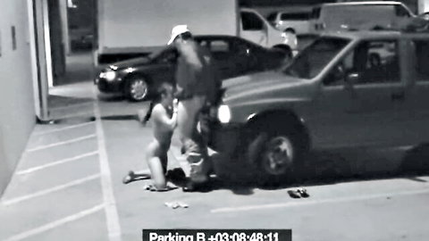 Amateur slut on knees giving blowjob to security guard in parking garage to dodge fine