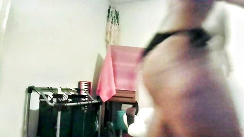 Ebony webcam babe bends over showing massive black ass cheeks in tiny thong