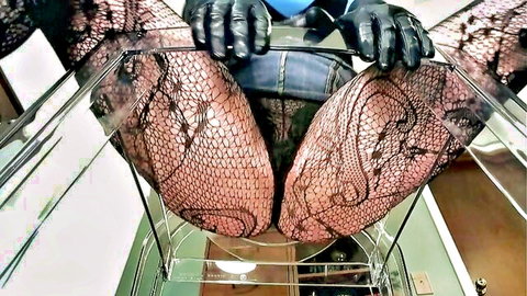POV of dominant woman in fishnets and gloves facesitting over your face