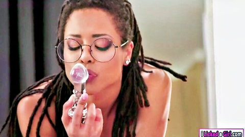 Kira Noir ebony beauty kissing clear glass anal toy, topless tease