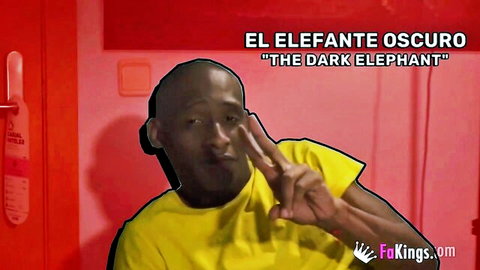 Black bald man in yellow shirt makes peace sign in cuckold rage quit fail