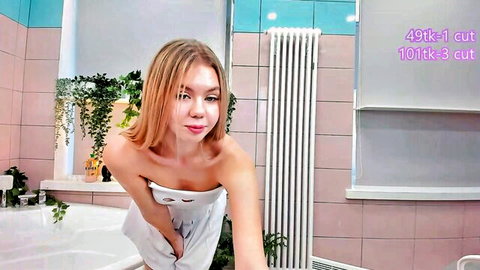 Shy blonde teen Cassie Palmer wrapped in towel, teasing after bath on Chaturbate