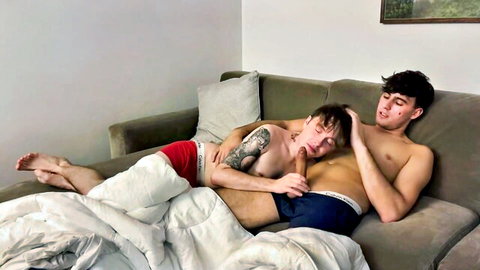 Kyle and Kam shirtless in underwear, cuddling intimately with tattoos and abs