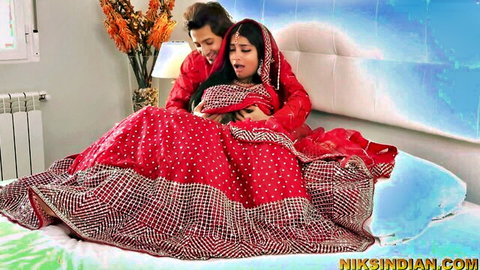 Yasmina Khan as desi bride in red lehenga embraces Niks Indian on wedding night