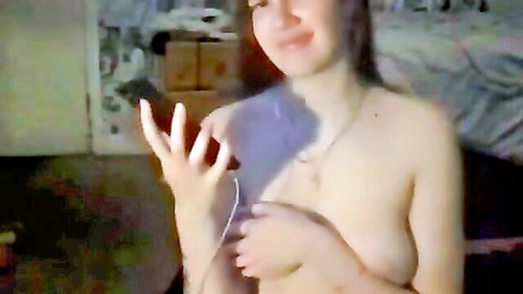 Minakakitty topless Hispanic camgirl smiling seductively