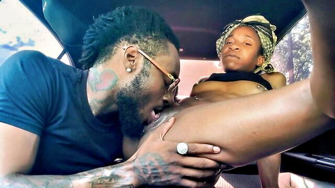 Ebony model CreamForMeBaby topless in car, tits sucked by tattooed black guy EboBlack