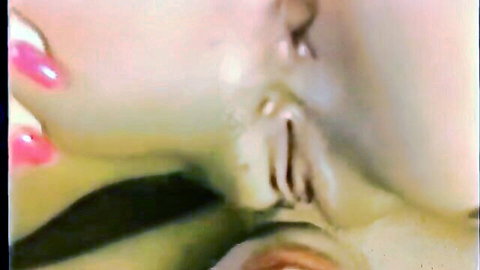 Sissy with pink nails spreads and licks wet pussy lips close-up