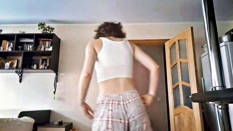 Skinny young webcam teen bends over pulling down plaid pajama pants exposing bare tight ass cheeks