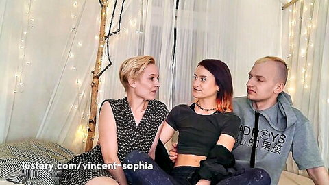 Petite blonde and brunette with shaved-head guy cozy up teasing threesome on bed