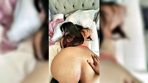 Curvy BBW with massive bare ass lying face down on bed as hand gropes her thick cheeks