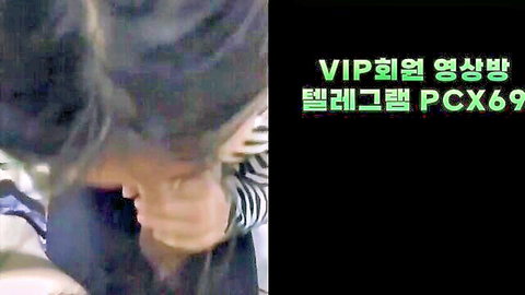 Korean girl in striped top sucking thick cock with hand gripping base in closeup blowjob
