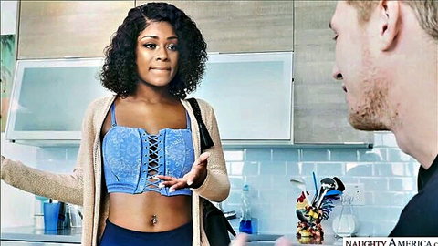 Sexy ebony babe in blue lace-up top and cardigan flirts with white guy in kitchen