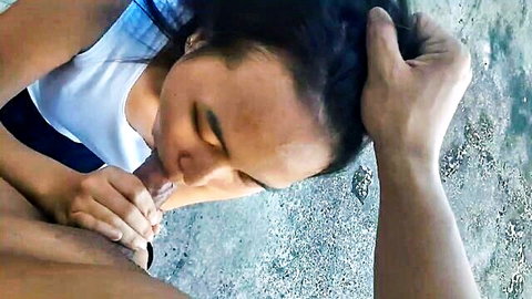 Pinay student giving blowjob in intimate amateur scene