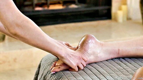 Lauren Phillips gives Maya Woulfe a sensual foot massage