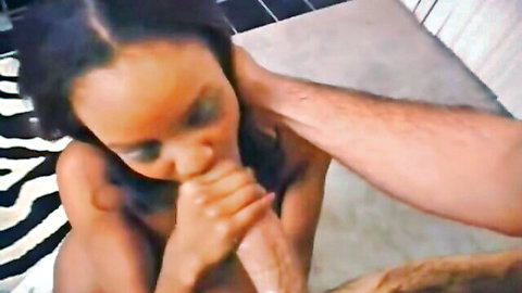 Ebony babe Cinnamon deepthroating cock in steamy oral scene