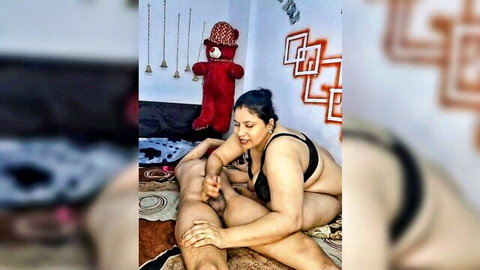 Curvy Asian mom in black bra straddling nude man in roleplay cam show