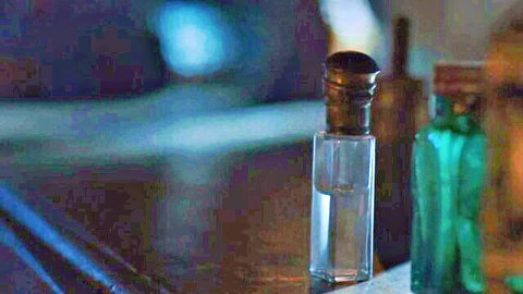 Carice van Houten nude scenes artistic thumbnail with glass bottles