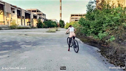 Jeny Smith biking in short dress, exposing bare ass in abandoned urban area