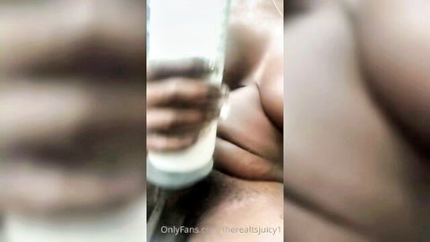 Shemale with big black cock fucks Fleshlight and cums in glass