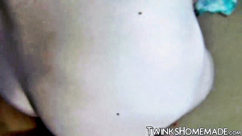Closeup of smooth pale twink ass spread showing tight pink asshole