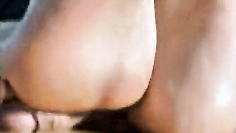 Curvy woman in black high heels during intense rear penetration