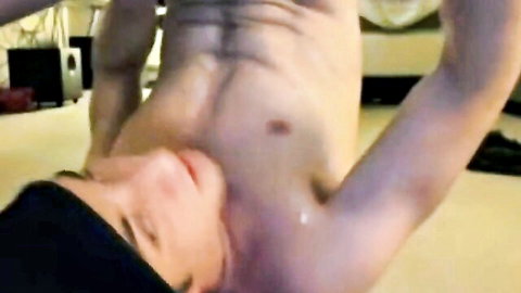 Muscular Asian slave boy in white socks, hanging upside down post-cumshot