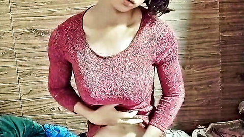 Crossdresser Daralux solo tease in red sparkly top, hand on crotch