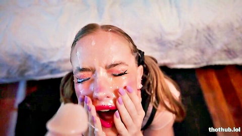Blonde teen in pigtails covered in cum facial bukkake