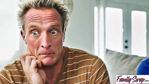 Mature blonde man in striped shirt offers sperm in family swap scene