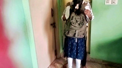 Indian college girl in skirt and backpack posing after class for couples sex video