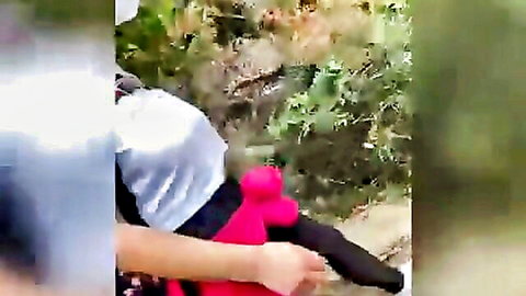 Russian woman in public outdoor tease with pink toy and stranger