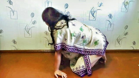 Hot Indian wife in saree crawling on floor, showing plump butt cheeks