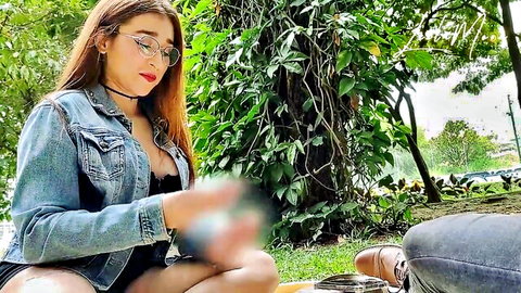 Brunette in denim jacket teases with blurred touch during naughty park picnic